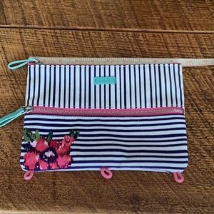 Vera Bradley 9 1/2” x7” zip pouch. One outside zip pocket.